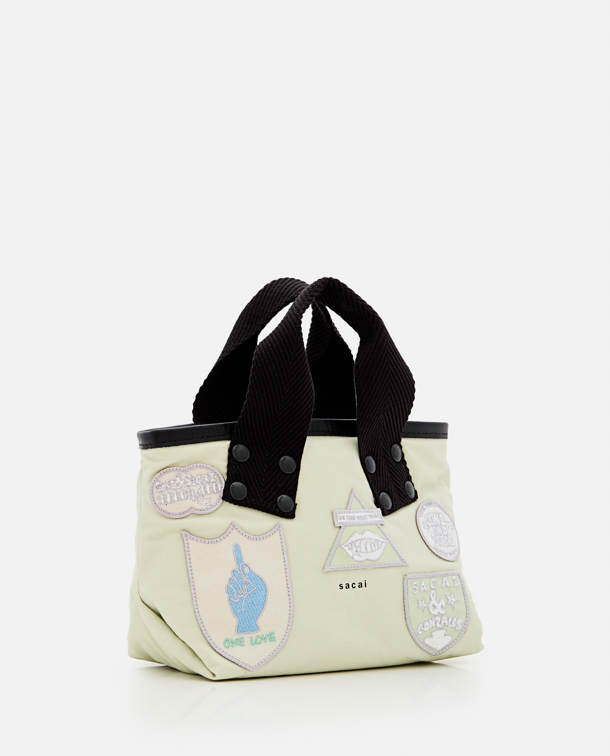 sacai × Mark Gonzales トートバッグ サカイ ゴンズ コラボ Sacai SACAI X MARC GONZALES パッチ付き小型トートバッグ ¥67,981 JPY